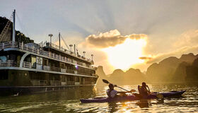 Awaken to emerald waters and limestone dreams on your Vietnam Tours